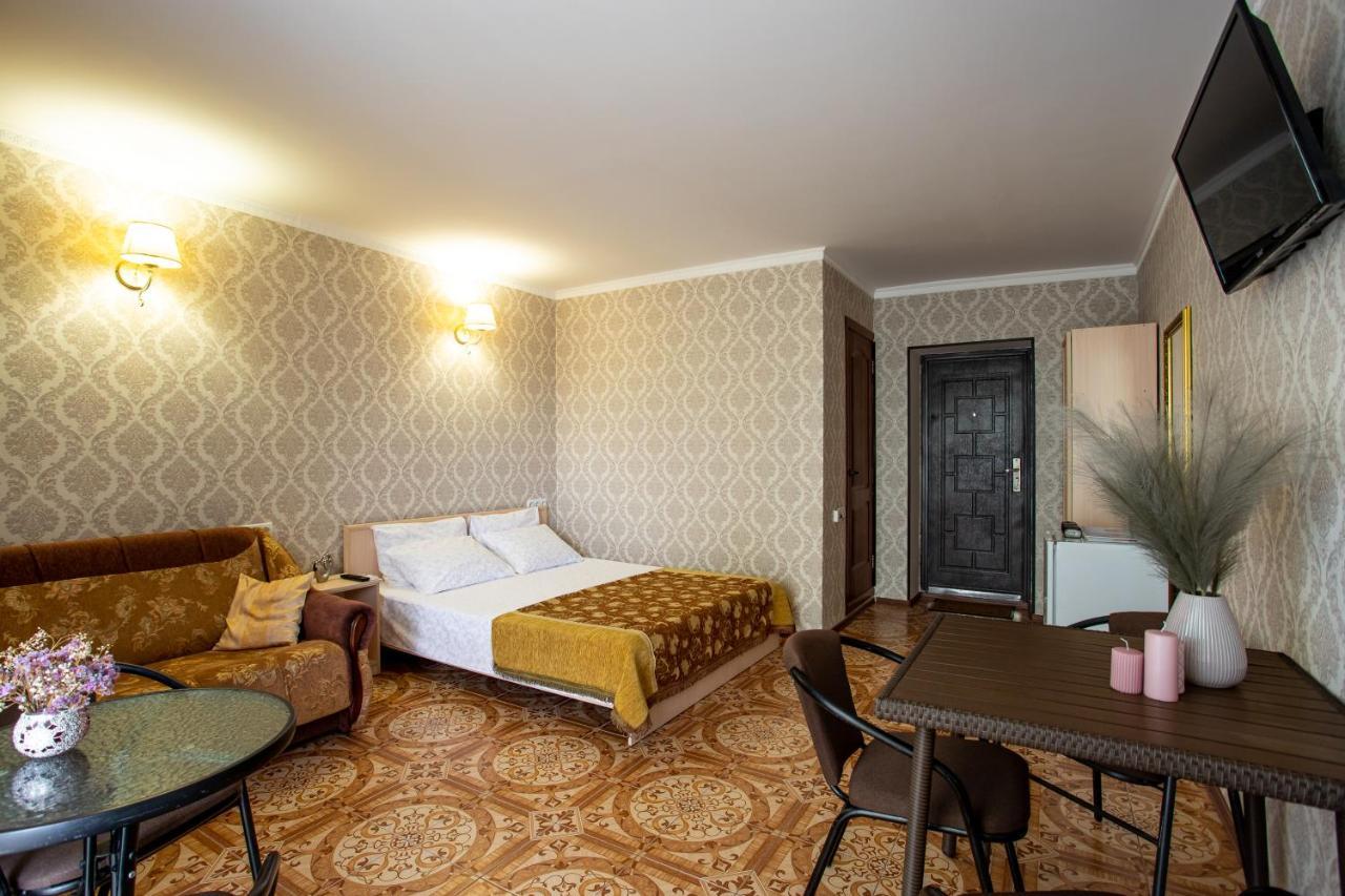 Олимп Hotel Zaliznyy Port Bagian luar foto